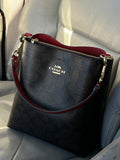 BOLSA COACH CON STRAP